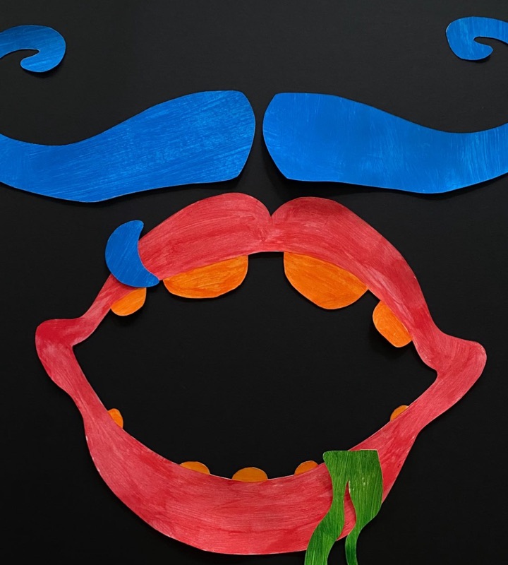 Cut-paper artwork in blue, red, orange and green on a black ground